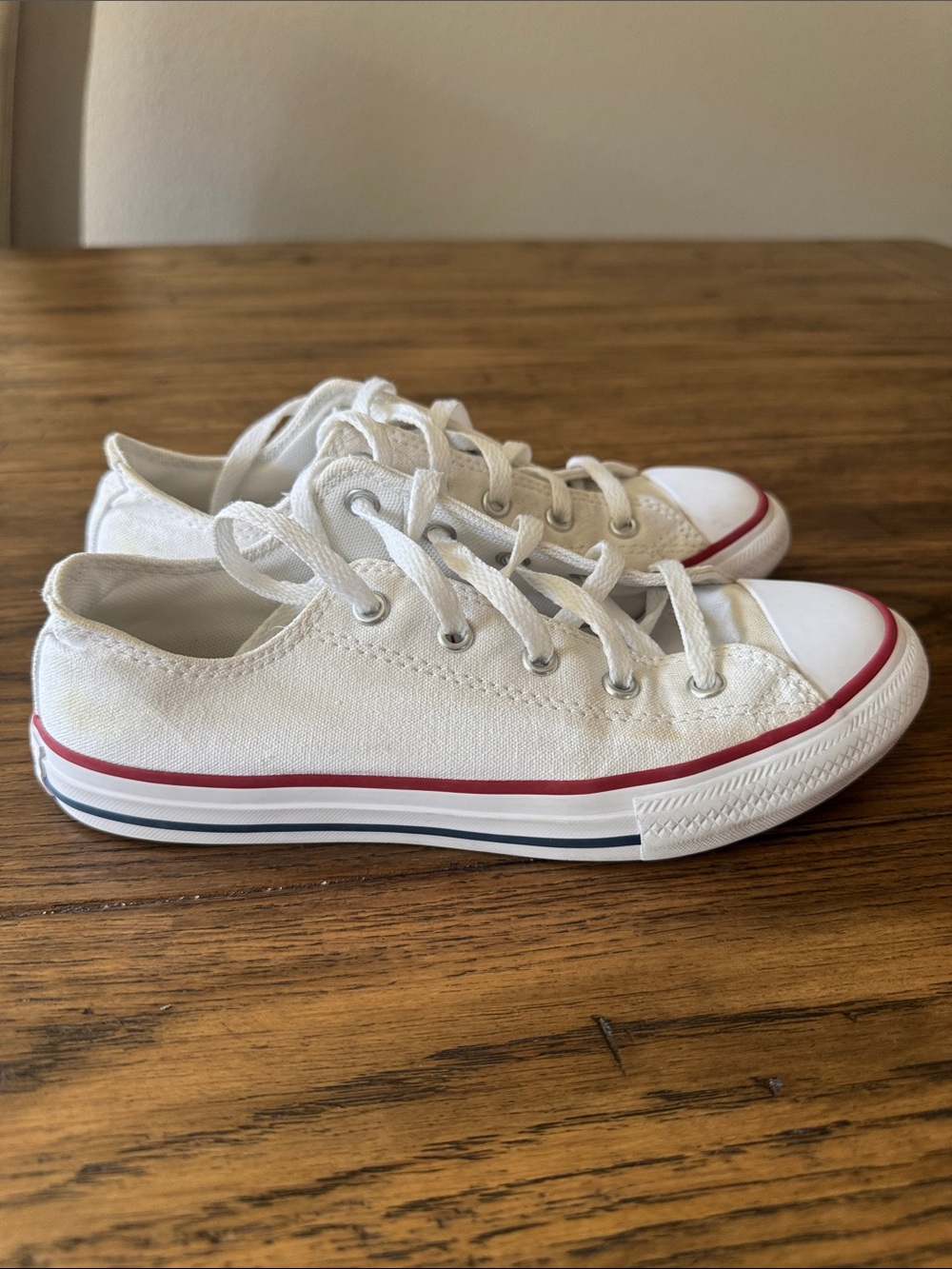 Girls White Converse Low-Top Sneakers with Red Trim